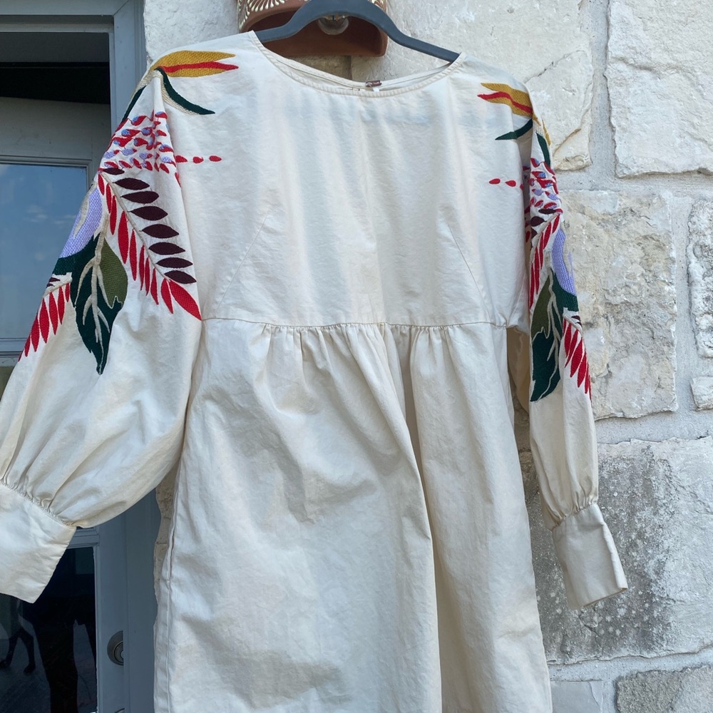 Gently used Free People top/dress size small embroidered sleeves